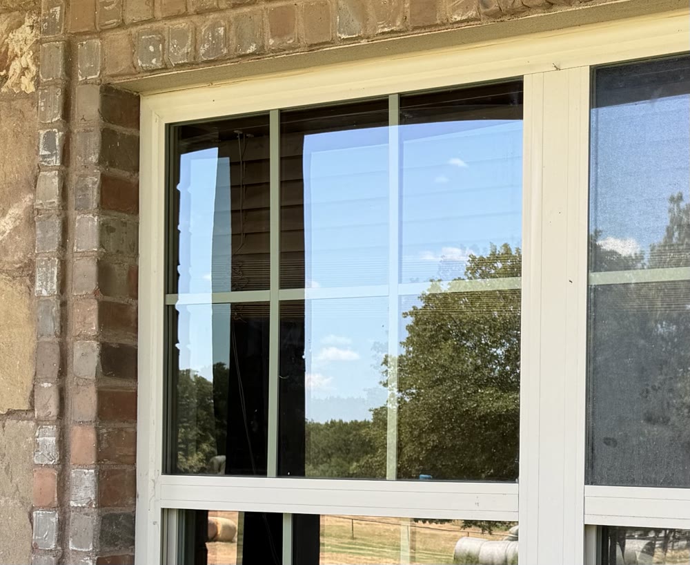 The same window streak-free and clear after cleaning